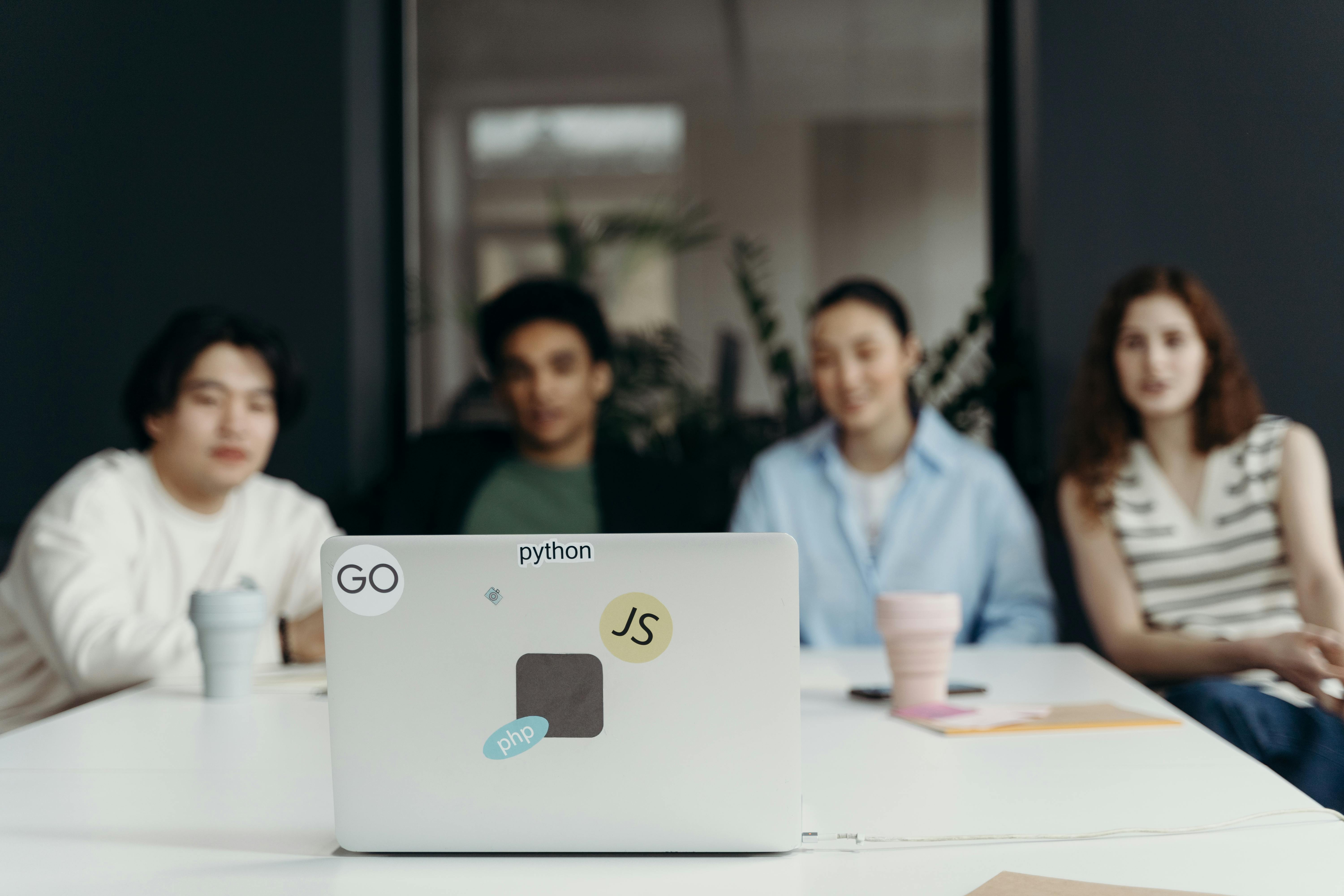 Diverse team of software developers collaborating on enterprise solutions